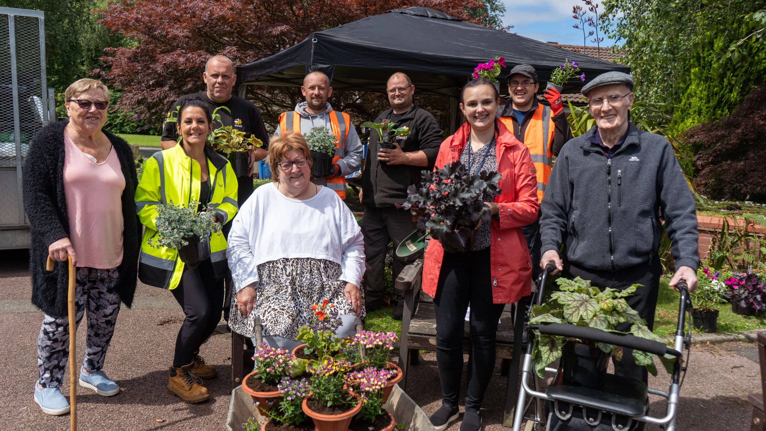 team and residents at potting day